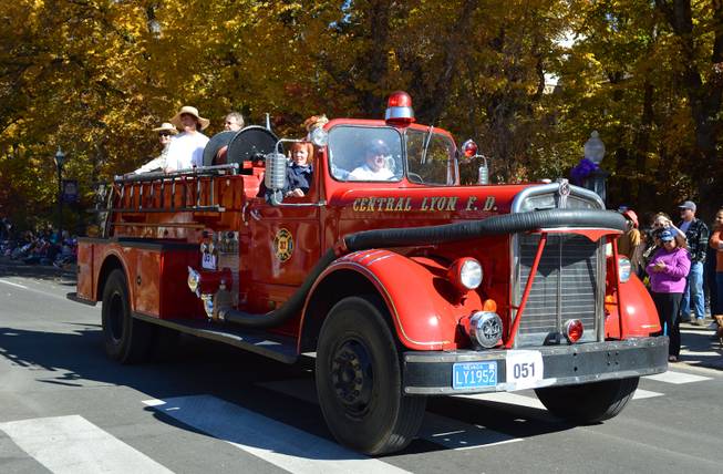 A truck representing the Central Lyon County Fire Protection District drives in the annual Nevada Day parade in Carson City on Oct. 26, 2013.